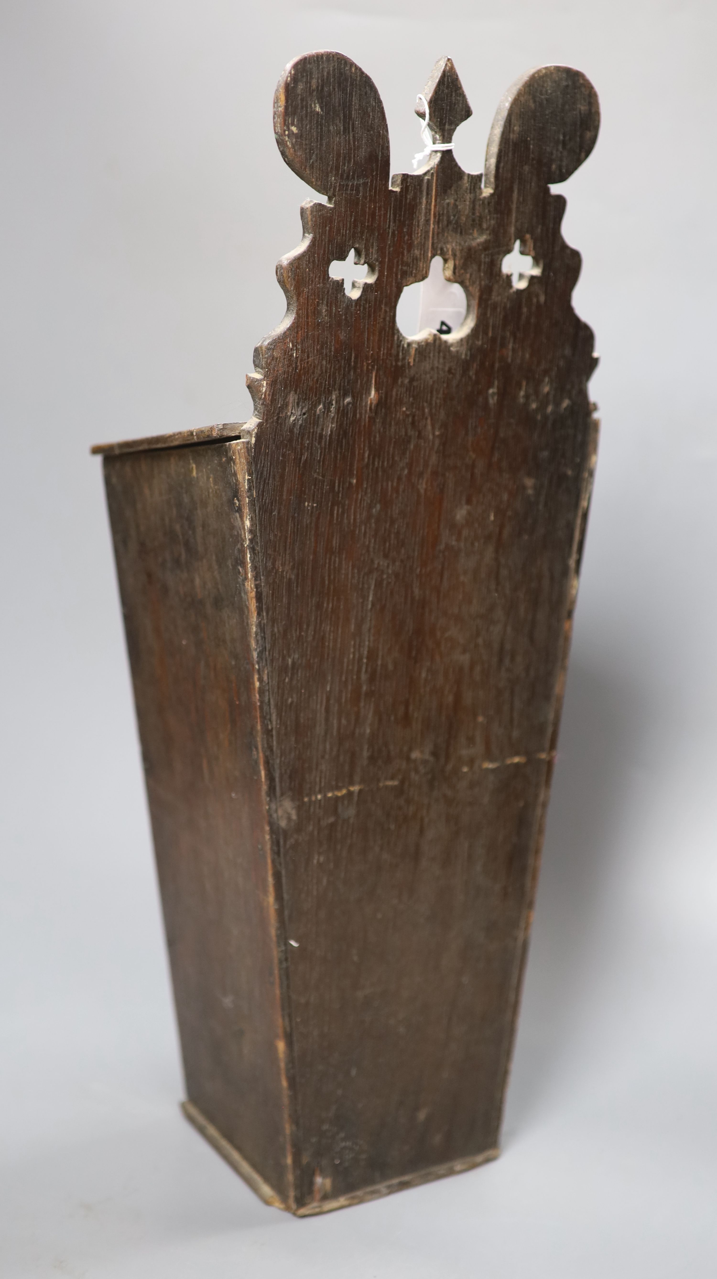 An early 19th century mahogany wall mounting candle box, length 49.5cm